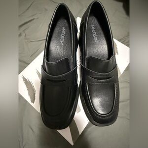 Maddison Black women’s leather heeled Loafers